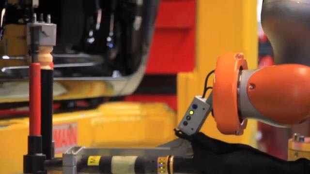 У рабочих автозавода Ford в Кёльне появились напарники роботы смотреть онлайн