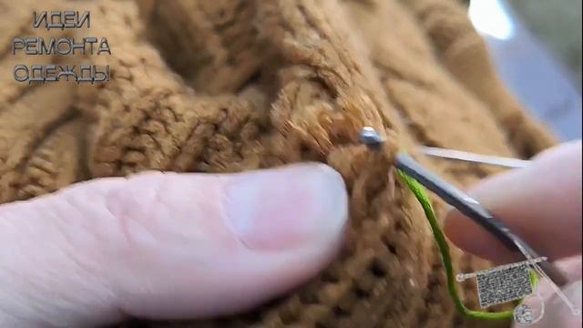 Slow motion video of a wool sweater being repaired смотреть онлайн