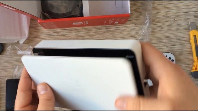 Распаковка Nintendo Switch OLED от Stratege.ru смотреть онлайн