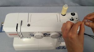 Намотка шпульки (на примере, электромеханической швейной машины Janome 1547)