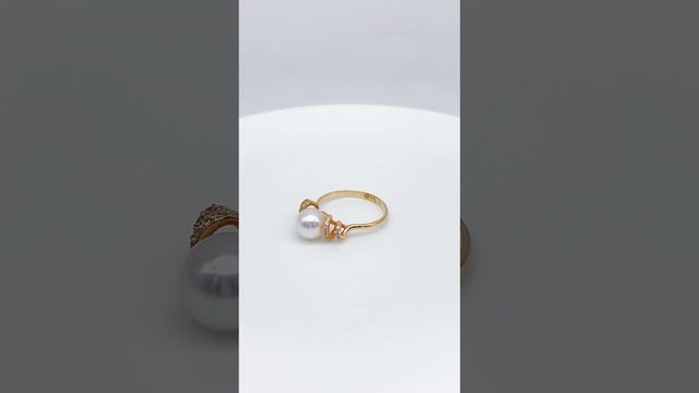 Кольцо из красного золота 585 пробы с жемчугом и фианитами 1101542_0000051403 смотреть онлайн