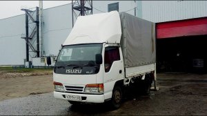 Замена лобового стекла на грузовике Isuzu Elf Перевозчик31