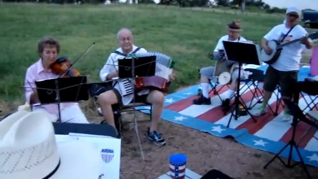 Will the Circle be Unbroken being played at an overnight camp out jam session смотреть онлайн