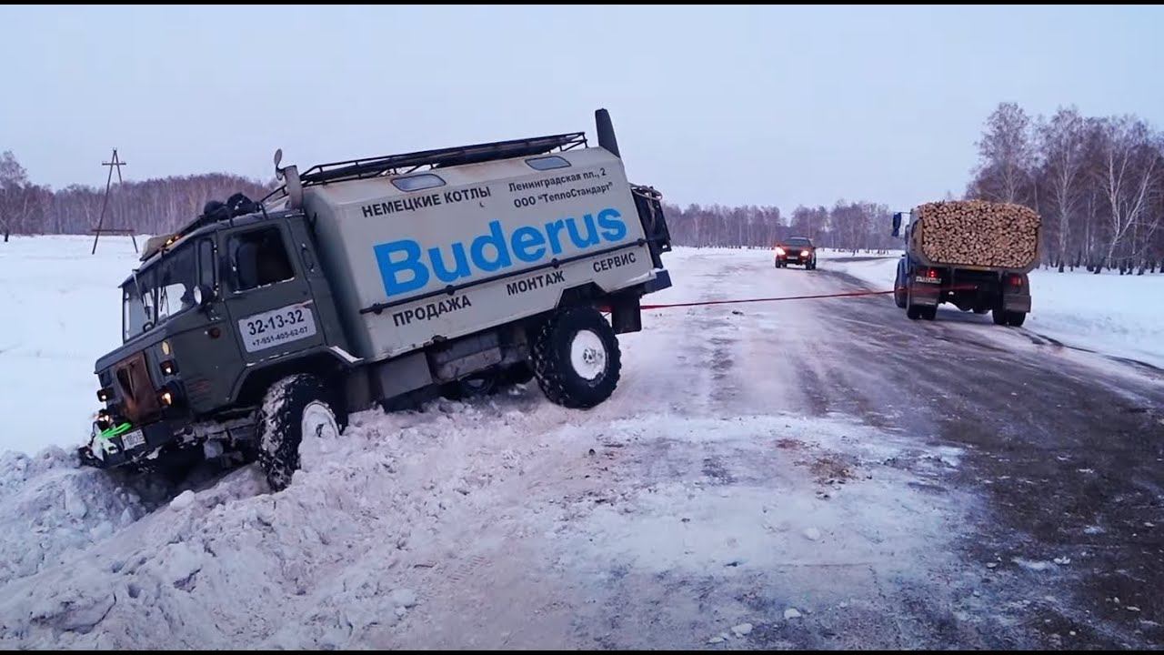 ЗИЛ с дровами вытащит ГАЗ-66 ? смотреть онлайн