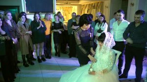 Снятие фаты у невесты и зажжение очага семьи