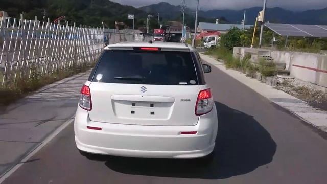 Видео-тест автомобиля Suzuki SX4 (белый перламутр, YA41S-100628, J20A, 2006г) смотреть онлайн