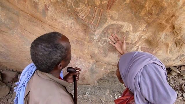 Archaeologist Dr. Sada Mire at Laas Geel explaining rock art in Somali смотреть онлайн