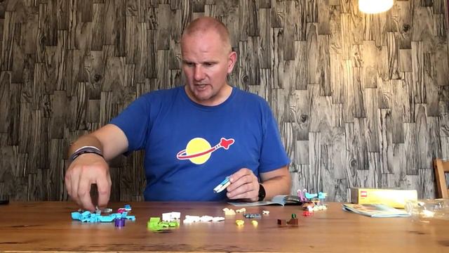 Opening and assembling Lego Creator 3 in 1 set 31128 Build 2 Seahorse and Sea Snail смотреть онлайн