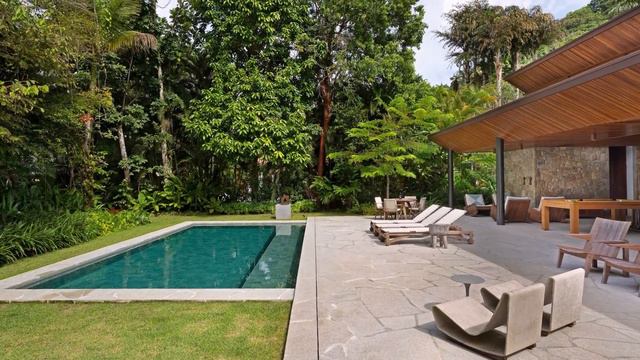 Modern Architectural House Design Seamlessly Blends With The Natural Landscape смотреть онлайн