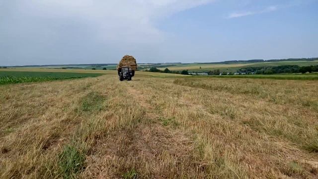 погрузка тюков, РЕКОРД, заготовка сена. смотреть онлайн