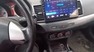 Mitsubishi Lancer 10 Установка Магнитола Unison 10А4 /4+64Гб/ Экран 10”/1280х720/Qled/Sim4G /DSP