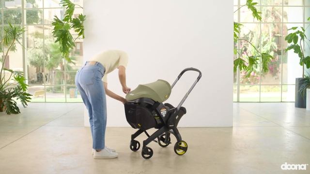 How to attach the Snap on Storage | Doona Car Seat & Stroller Accessories смотреть онлайн