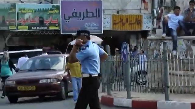 регулировщик в Рамалле