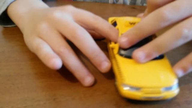 Модель машины Autotime (WELLY) 1:34-39 Lada 110. Такси