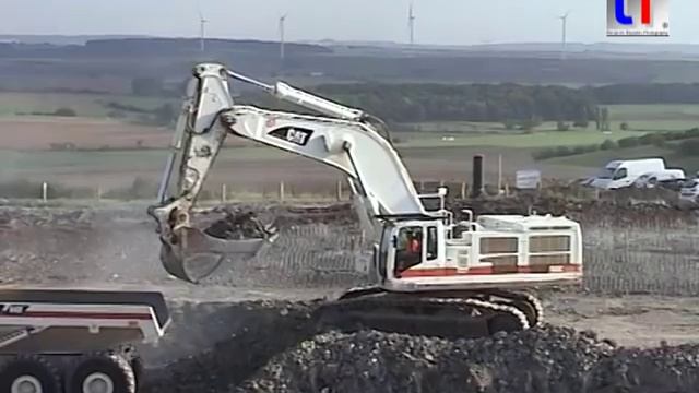 LGV ESt, Lot 35: CAT 385C LME & VOLVO A40F, Destry, France, 23.08.2011.