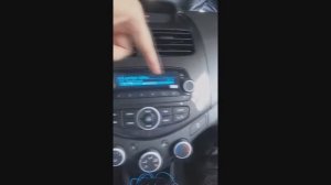 how to set the clock in a 2014 chevrolet spark