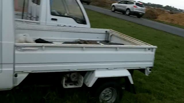 WORLDS SMALLEST TRUCKS MITSUBISHI MINICAB AND CUSHMAN THREEWHEELER