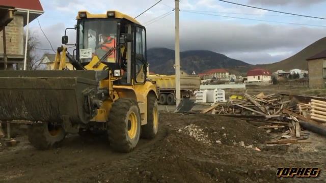 Экскаватор погрузчик с ковшом бетономешалкой, бетоносмесительным! смотреть онлайн