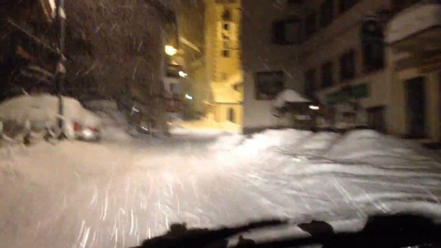 CANAZEI Dolomiti Val di fassa driving around the town in a snow heavy snow storm смотреть онлайн