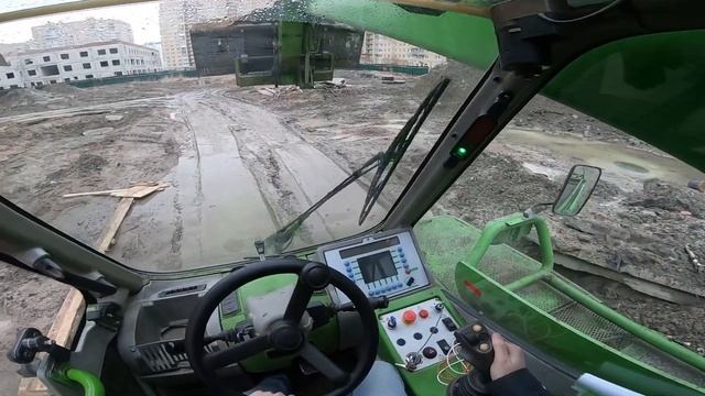 Засыпка фундамента погрузчиком. Merlo 40.25 Telescopic Loader POV Drive смотреть онлайн