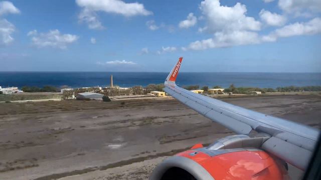 Easy Jet Airbus A320 NEO aborted windy landing and go round at Santorini Thira airport May 2019 смотреть онлайн