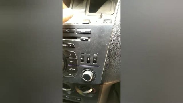 Мазда 3 как снять Магнитолу ,прикуриватель и консоль смотреть онлайн