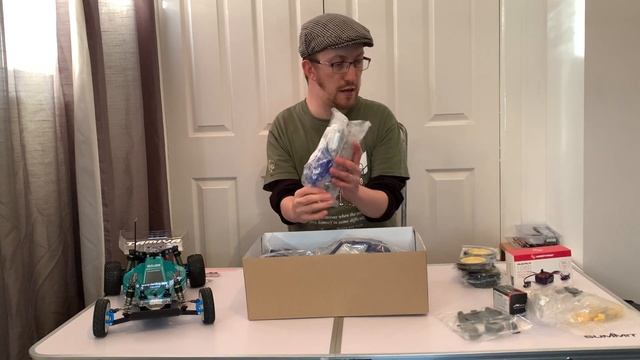E82: Tamiya DT02 Holiday Buggy Unboxing & Short Arm Conversion Plans смотреть онлайн