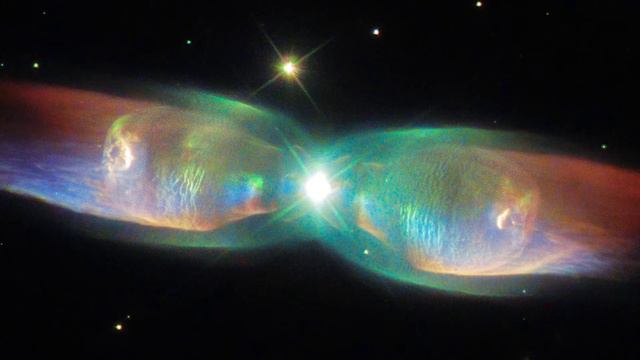 Galactic wings of the twin jet nebula The universe was studied by the Hubble space telescope смотреть онлайн