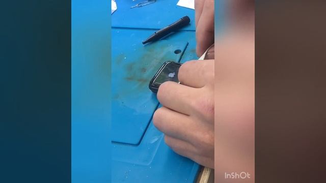 наклейка UF защитного стекла на Apple Watch 42/UF Sticker Of Protective Glass On The Apple Watch 42