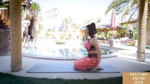 Ariella Ferrera practices yoga in her home