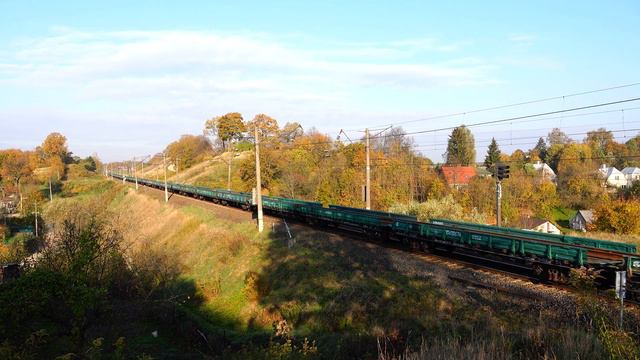 Тепловоз М62К-1181 перевозит рельсовые плети / M62K-1181 transporting long rails смотреть онлайн