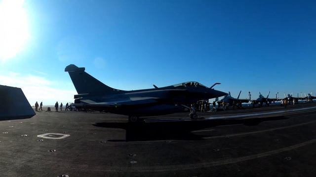 French Rafale Jet Gets ‘TAGGED’ By US Navy Sailor On Aircraft Carrier смотреть онлайн