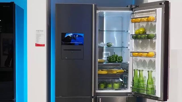 Sharp VacPac Pro a four-door refrigerator with a vacuum sealer incorporated in the upper left door. смотреть онлайн