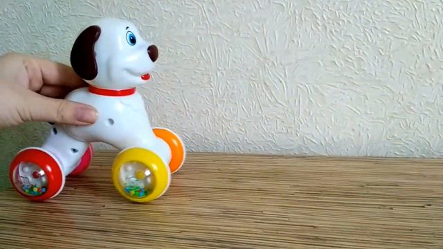 Игрушка-покатушка "Собачка" Стеллар-М смотреть онлайн