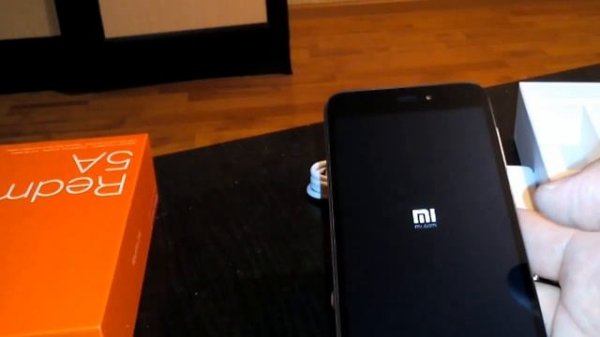 Распаковка и включение Xiaomi Redmi 5a