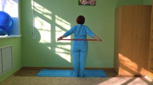 Упражнение с гимнастической палкой при шейно-грудном остеохондрозе.