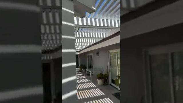 A new Alumawood Laguna Lattice pergola, with a roof mount adding height on the open-top patio cover смотреть онлайн