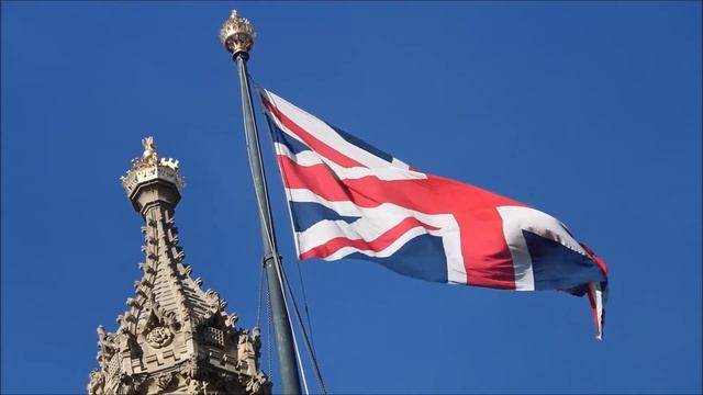 Stock Footage: Union Jack Flag flying above Houses of Parliament, UK смотреть онлайн