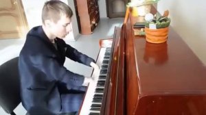 Пианист без пальцев Алексей Романов.