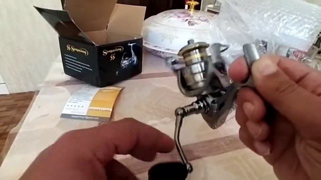 Качественная и недорогая катушка от Sougayilang смотреть онлайн