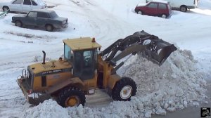 Фронтальный погрузчик Mitsuber, расчистка снега