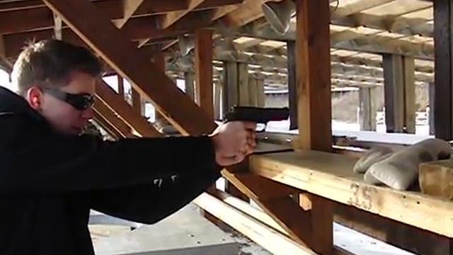 Shooting a Sig .45 Cal in slow motion смотреть онлайн