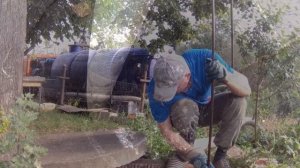 Удаление ила из выгребной ямы илососом