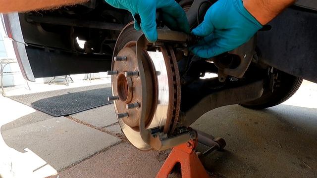 2004 NISSAN ARMADA - REPLACING FRONT BRAKE PADS - DIY смотреть онлайн