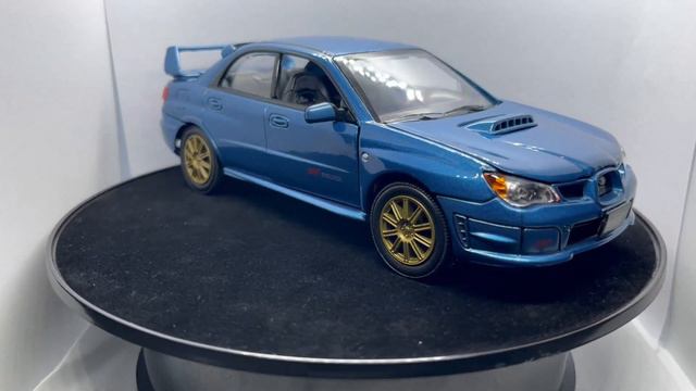 Subaru Impreza WRX STi in aqua blue, 1:24 scale diecast car model from Motormax, 73330A смотреть онлайн