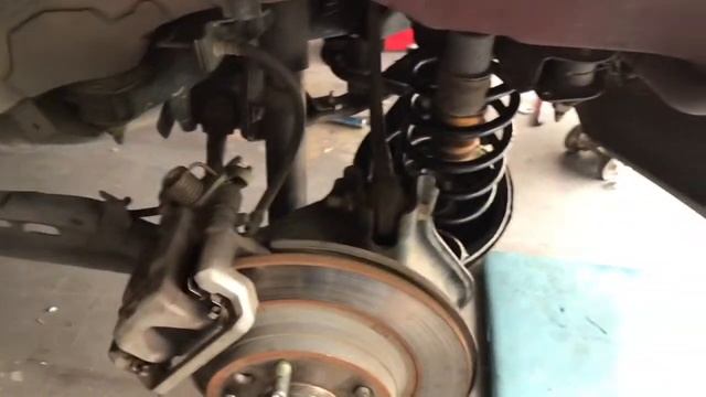 Rear upper control arm removal in a 2006 Ford Fusion and Mercury Milan and Mazda 6 смотреть онлайн