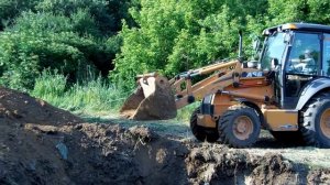 Экскаватор погрузчик.  Case 580 SR