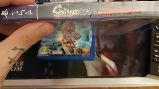 Unboxing : Scribblenauts Showdown PS4 смотреть онлайн