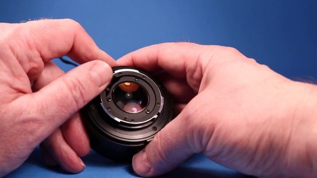 Minolta X-700 SLR 35mm film camera with 50mm F1.7 prime lens смотреть онлайн