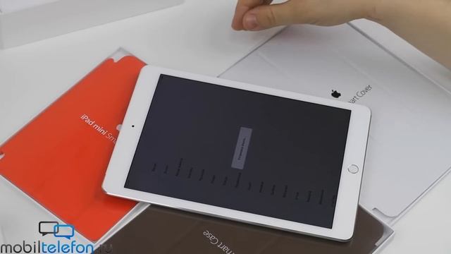 Распаковка iPad Air 2 и iPad mini 3, чехлов Smart Cover и Smart Case для них (unboxing) смотреть онлайн
